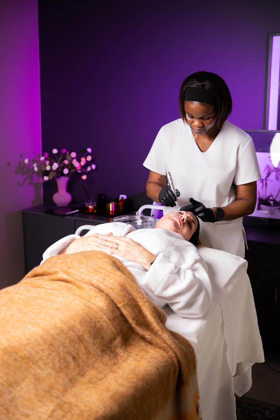 Amanda providing a skin treatment at Omnia