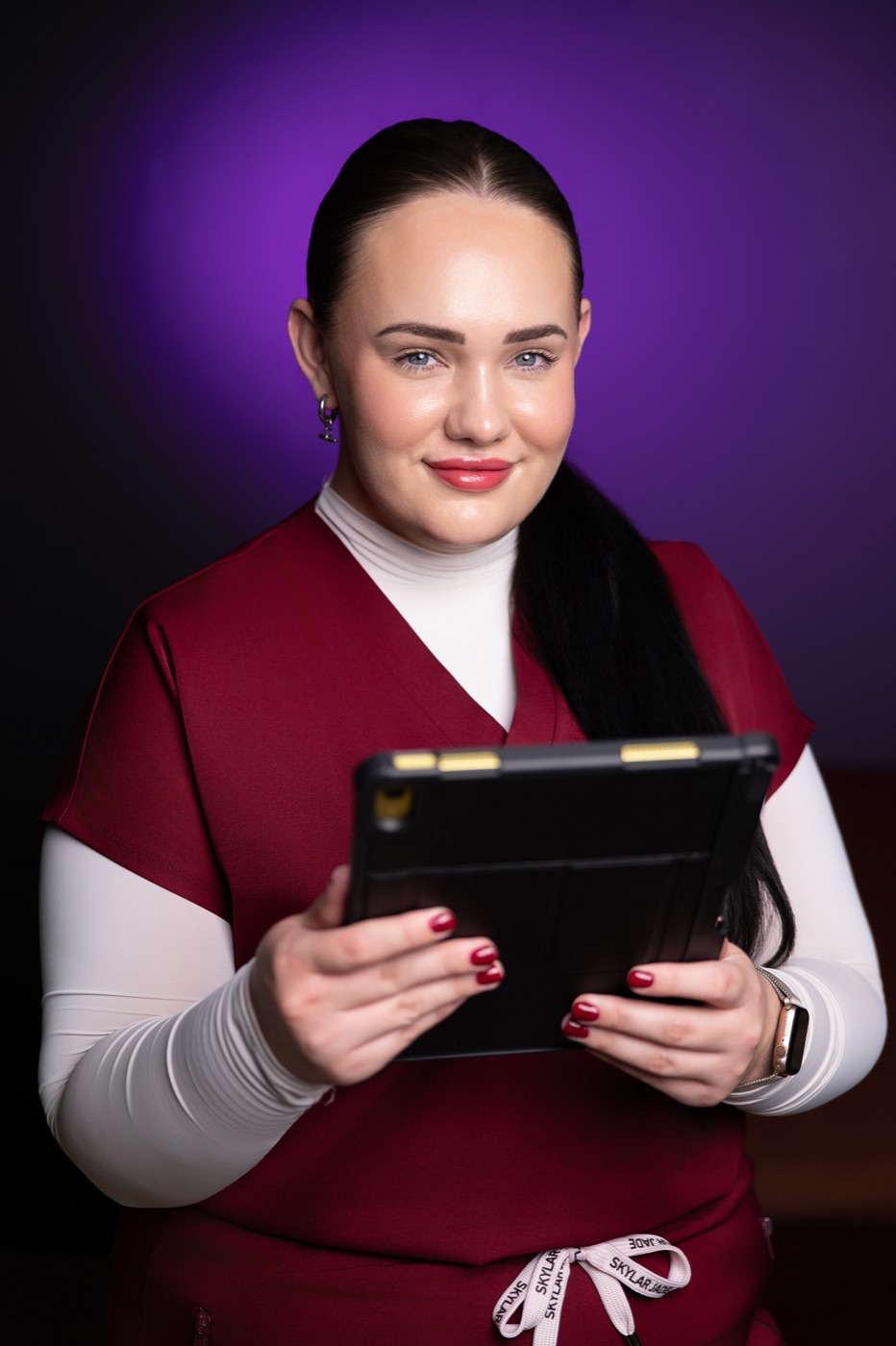 Caleigh assisting clients at Omnia